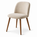Chaise en bois avec tissu bouclé beige