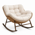 Chaise à bascule en rotin avec coussin en lin beige